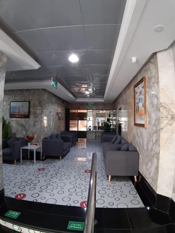 Lobby and common seating at PARIS Furnished Apartments LLC